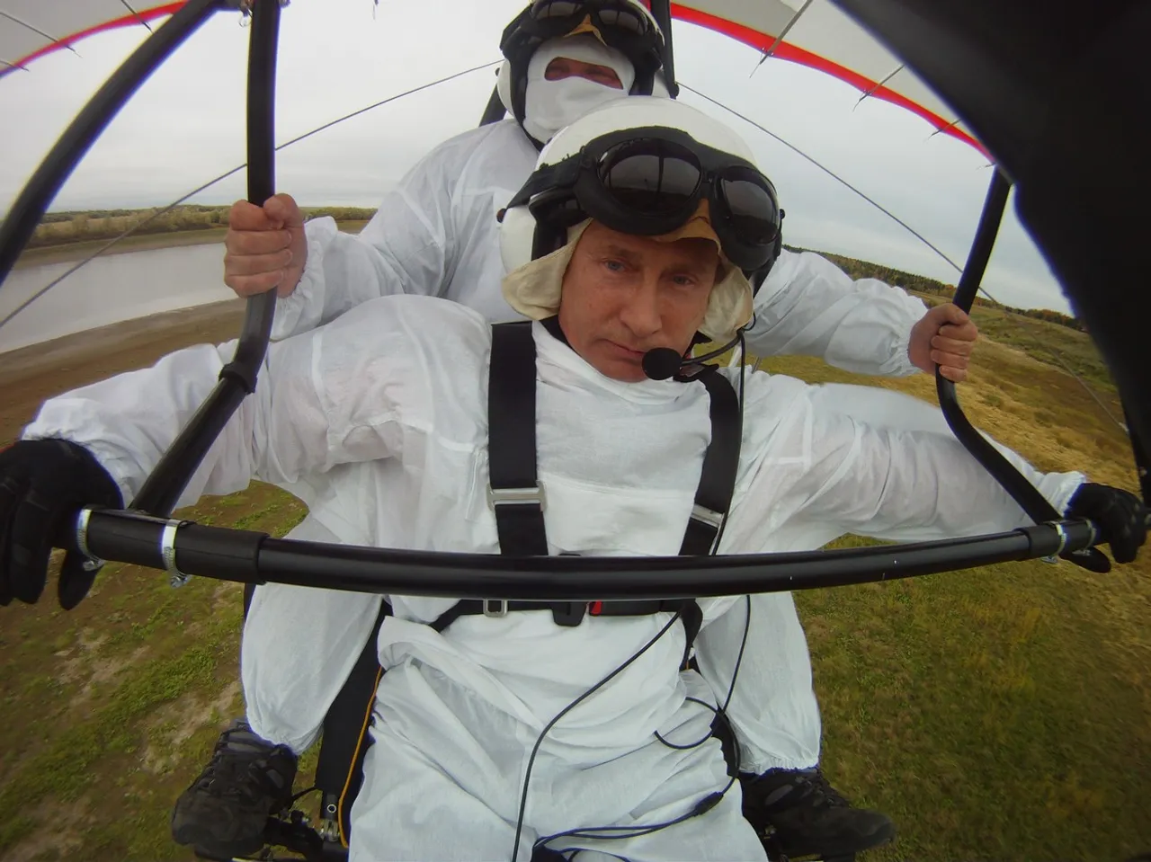 President Putin pilots hang-glider to lead baby cranes to Arctic home