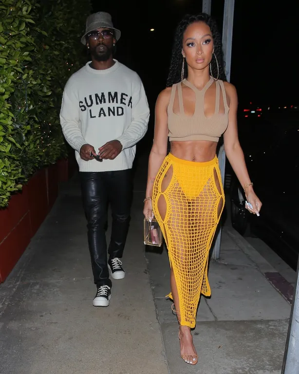 Draya Michele puts on a cheeky display stepping out with her boyfriend Tyrod Taylor in Santa Monica!