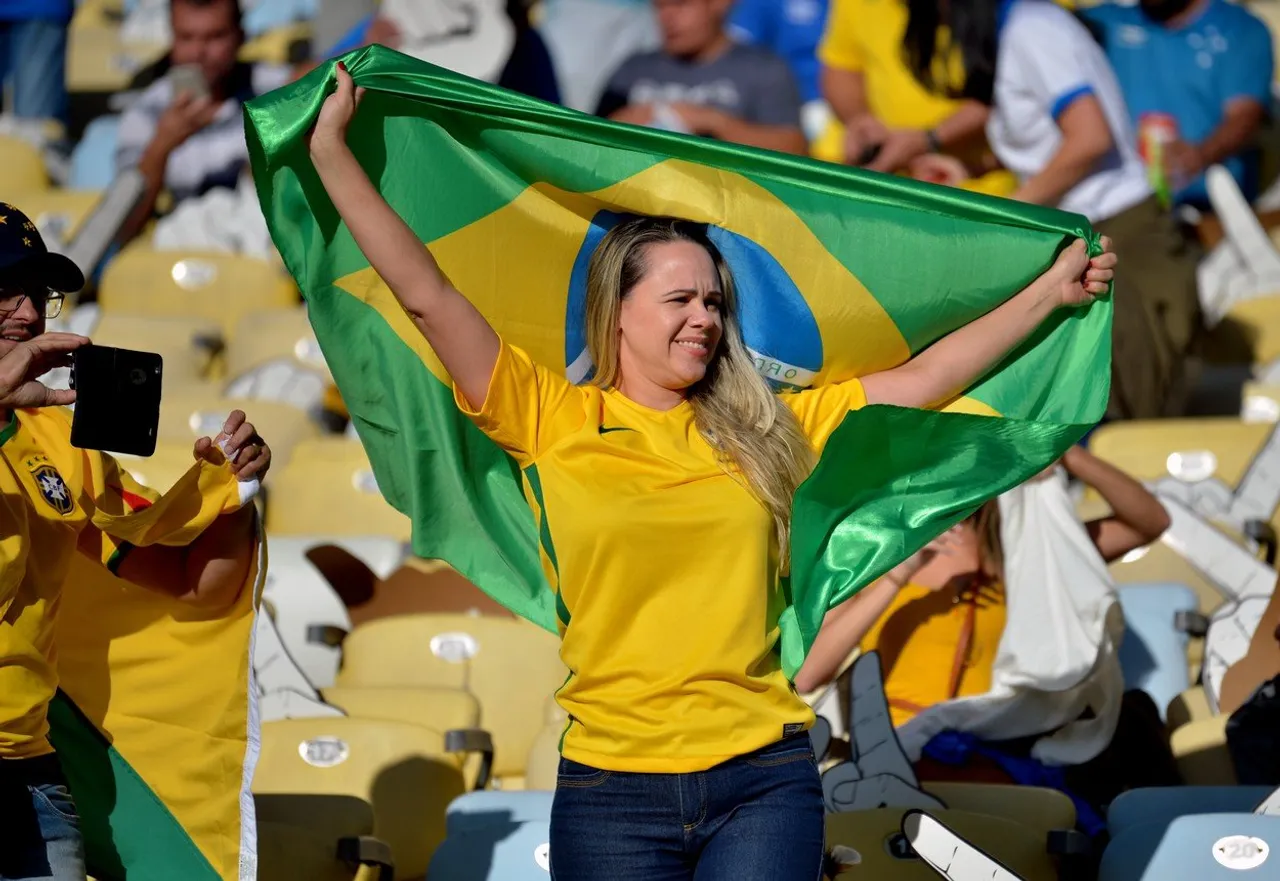 A fan of Brazil waits for the start of the Copa America football tournament final match against Peru at Maracana Stadium in Rio de Janeiro, Brazil, on July 7, 2019., Image: 455208130, License: Rights-managed, Restrictions: , Model Release: no, Credit line