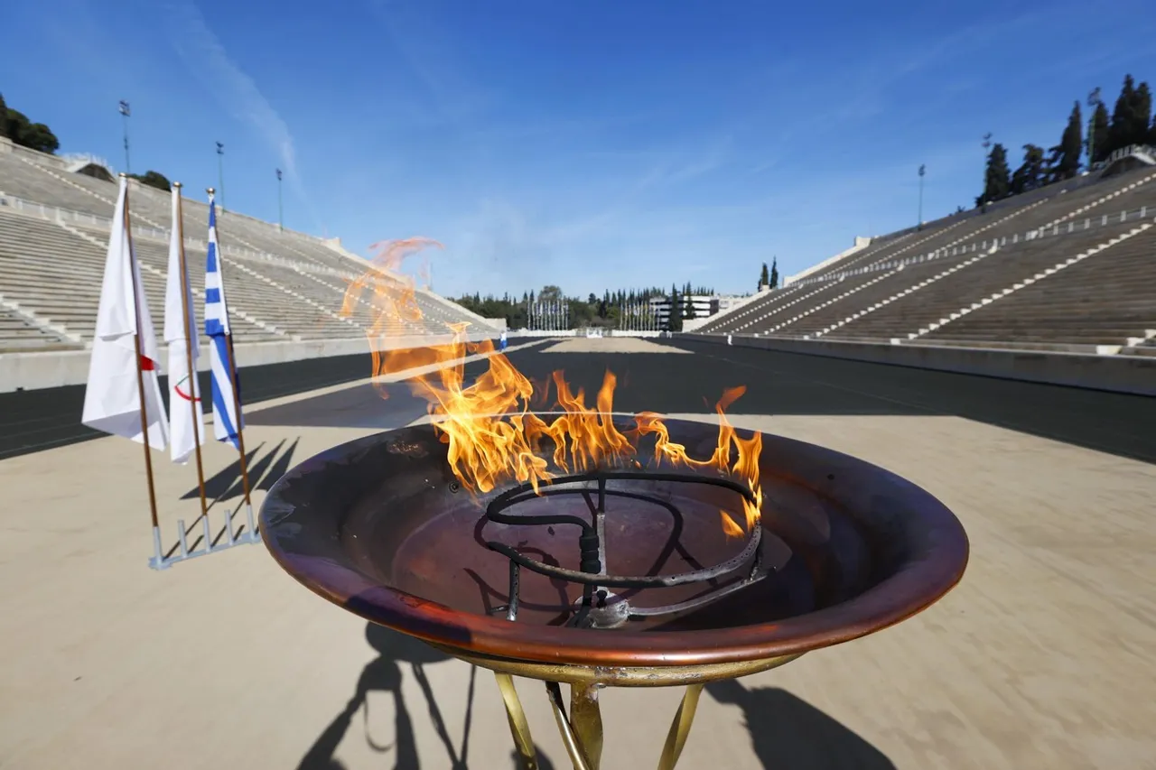 Olympic flame arrives at 1896 stadium