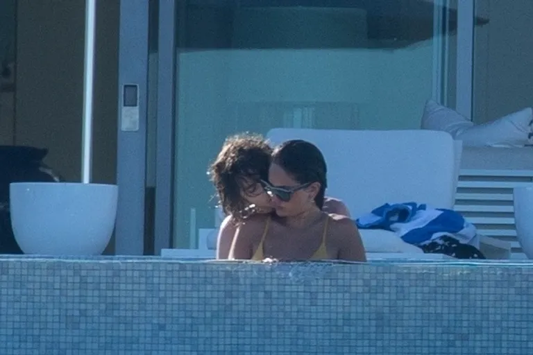*PREMIUM-EXCLUSIVE* Surprise New Couple! Timothee Chalamet and Eiza Gonzalez turn up the heat during VERY steamy PDA session in their pool while on holiday in Cabo