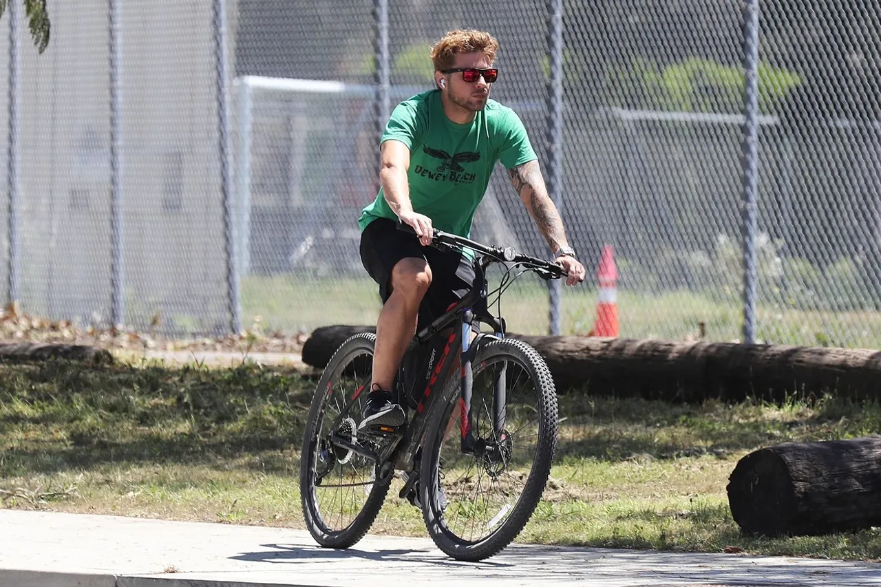 *EXCLUSIVE* Ryan Phillippe and son Deacon cycle around during safer at home order