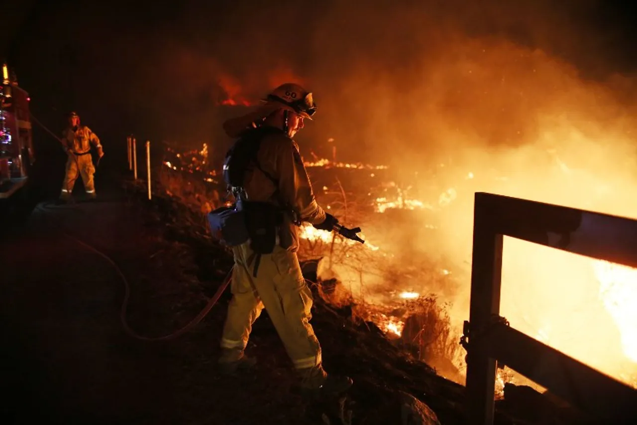 Wildfires scorch homes of the rich and famous in Los Angeles
