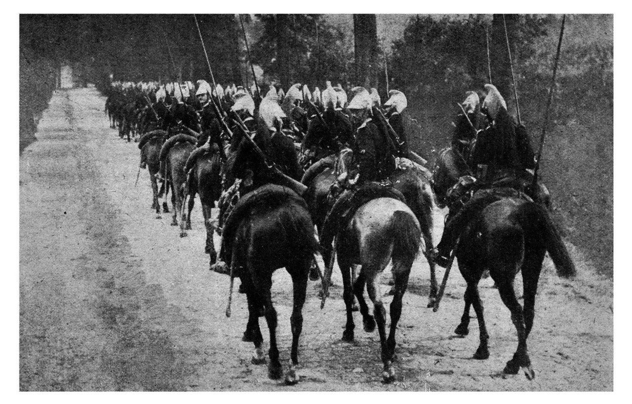 1914 French Cavalry mounted horse uniform lance saber rifle winter snow road marching march column