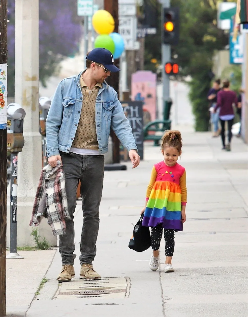 *EXCLUSIVE* Ryan Gosling takes his little rainbow Esmeralda out for a stroll in Los Angeles