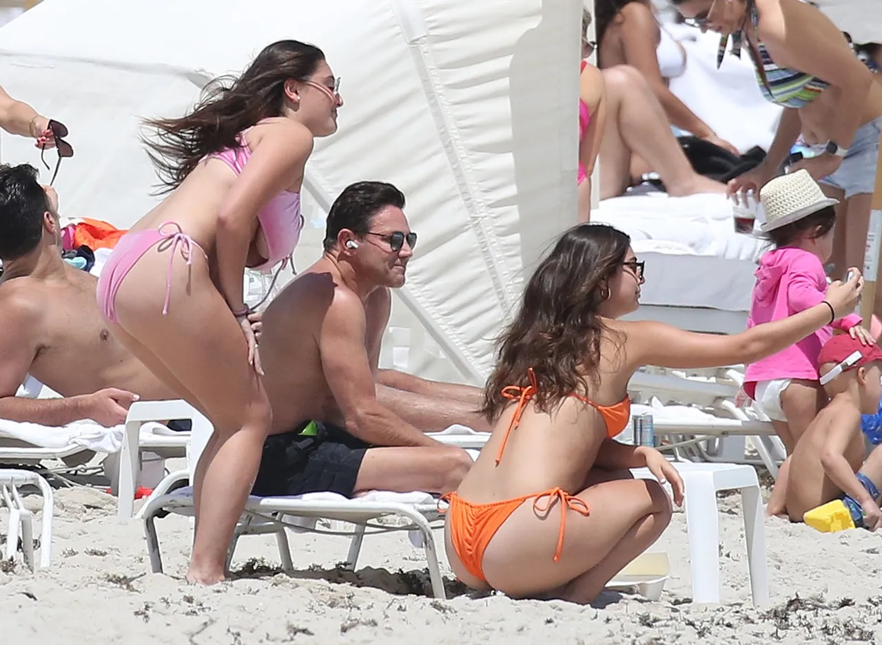 EXCLUSIVE: Jordan Belfort, the real Wolf of Wall Street, relaxes on the beach on Easter Sunday in Miami