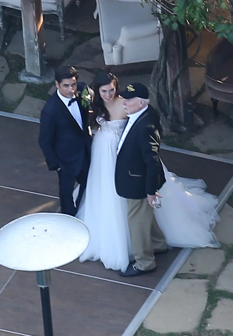 John Stamos i Caitlin McHugh