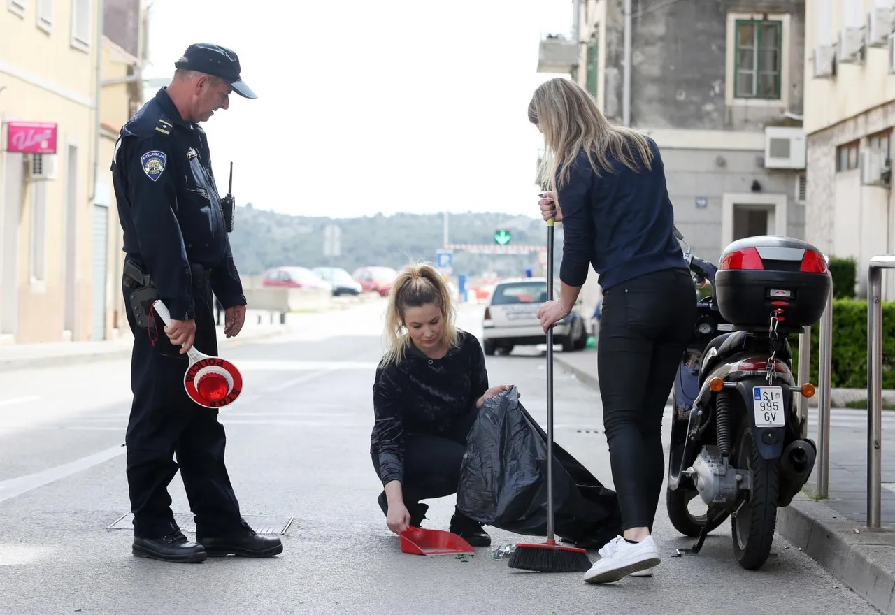 Čišćenje ulice nakon sukoba Funcuta i Tornada