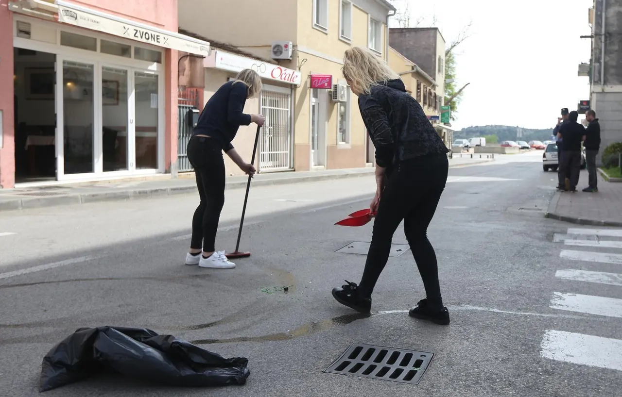 Čišćenje ulice nakon sukoba Funcuta i Tornada